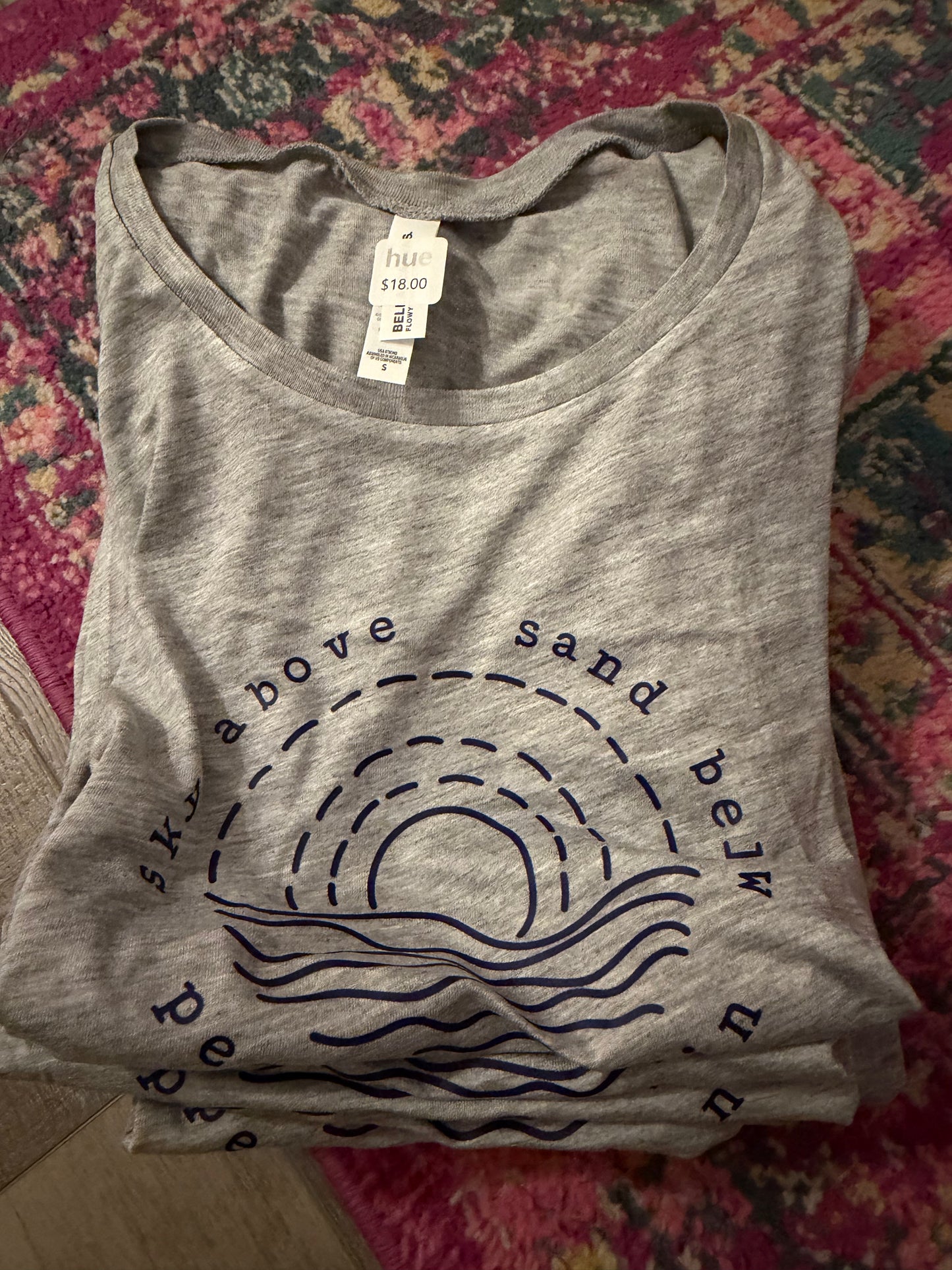Sky above sand below tank top