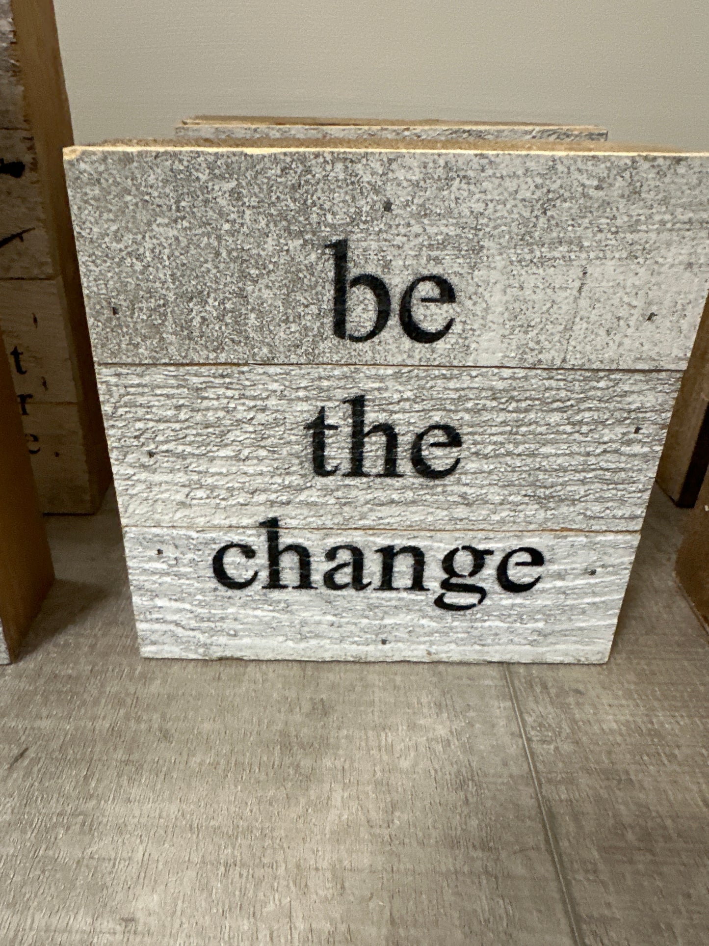 Be the change wood sign