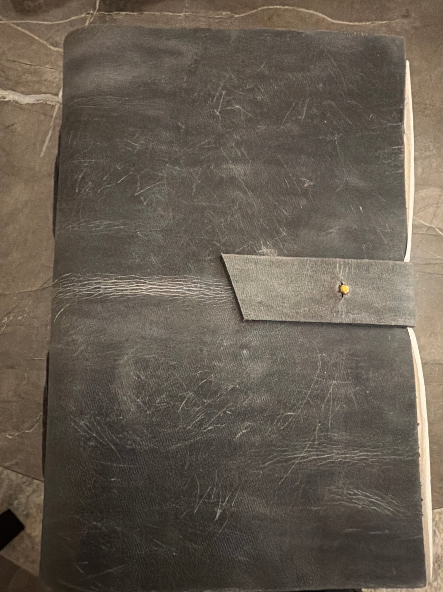 Distressed black leather journal