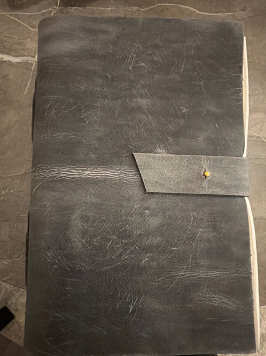 Distressed black leather journal